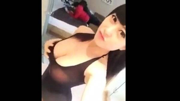 Busty Asian showing off her body - China on girlsasian.net