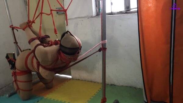 Bald Asian Tied Up Tight on girlsasian.net