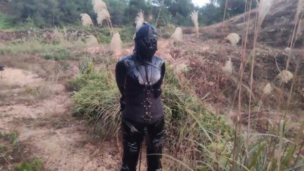 Asian Dressed In Latex And Bound on girlsasian.net