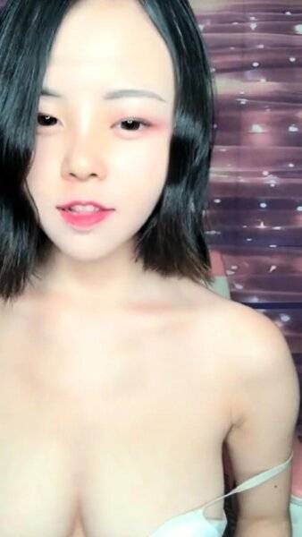 Horny amateur masked Asian teen toying on webcam show on girlsasian.net