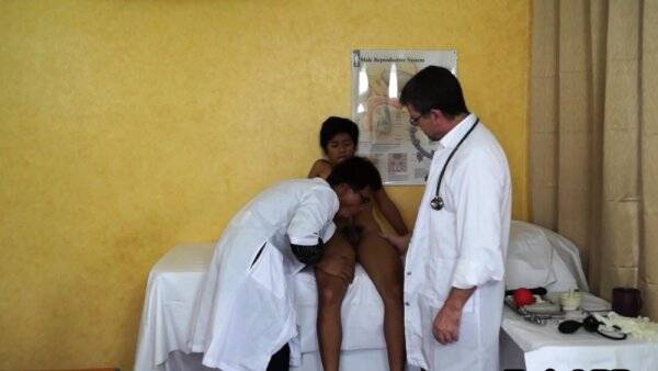 Asian twink in BJ 3some with doctors on girlsasian.net