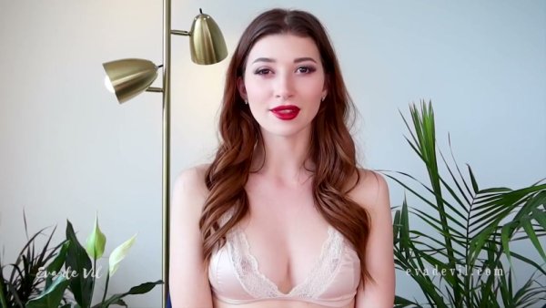 Brown-haired solo girl falls into trance while teasing her own cleavage on webcam on girlsasian.net
