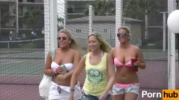 Bikini-clad women tease and mingle at a lively beachside party on girlsasian.net