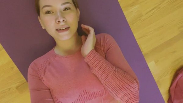 Young teen stretches into intimate yoga poses on her purple mat on girlsasian.net