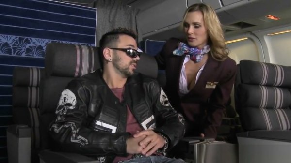 Clothed flight attendants and a police officer join two naked men in a steamy foursome on girlsasian.net