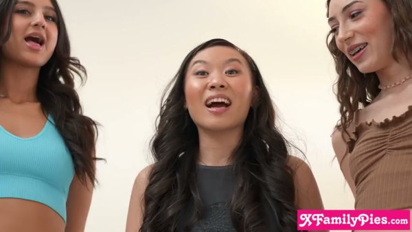 Petite Latina friends share intimate moments on the sofa and floor on girlsasian.net