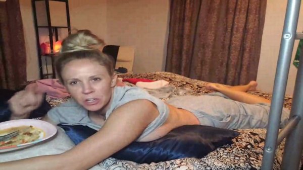 Blonde teases in bed with a playful wink just for you on girlsasian.net