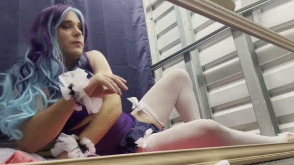 Feminine sissy in frilly purple dress and white stockings pleasures herself on girlsasian.net