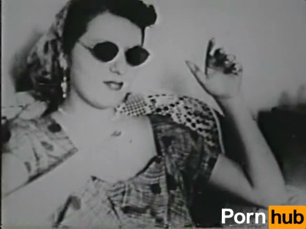 Voluptuous woman in vintage striptease seduces in black and white on girlsasian.net