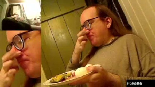 Woman eats a meal in a cozy wooden room on girlsasian.net
