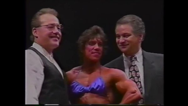 Danielle Leroy strikes a pose on stage at the 1994 NPC USA Nationals - Usa on girlsasian.net