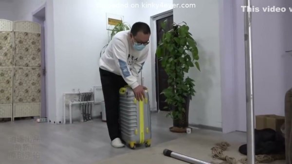 Woman masterfully bound in intricate rope and gagged during intense BDSM session on girlsasian.net