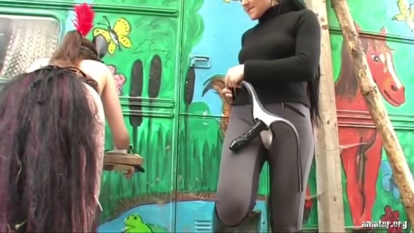 Lesbian strapon play in the woods and rustic dungeon with stockings and bondage on girlsasian.net